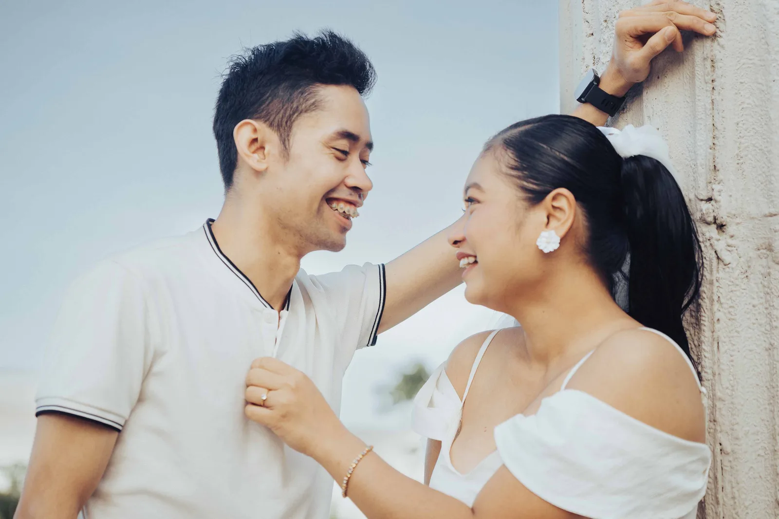 Couple laughing together at Perlas ng Silang garden, Cavite — engagement photography by Vivid Visuals