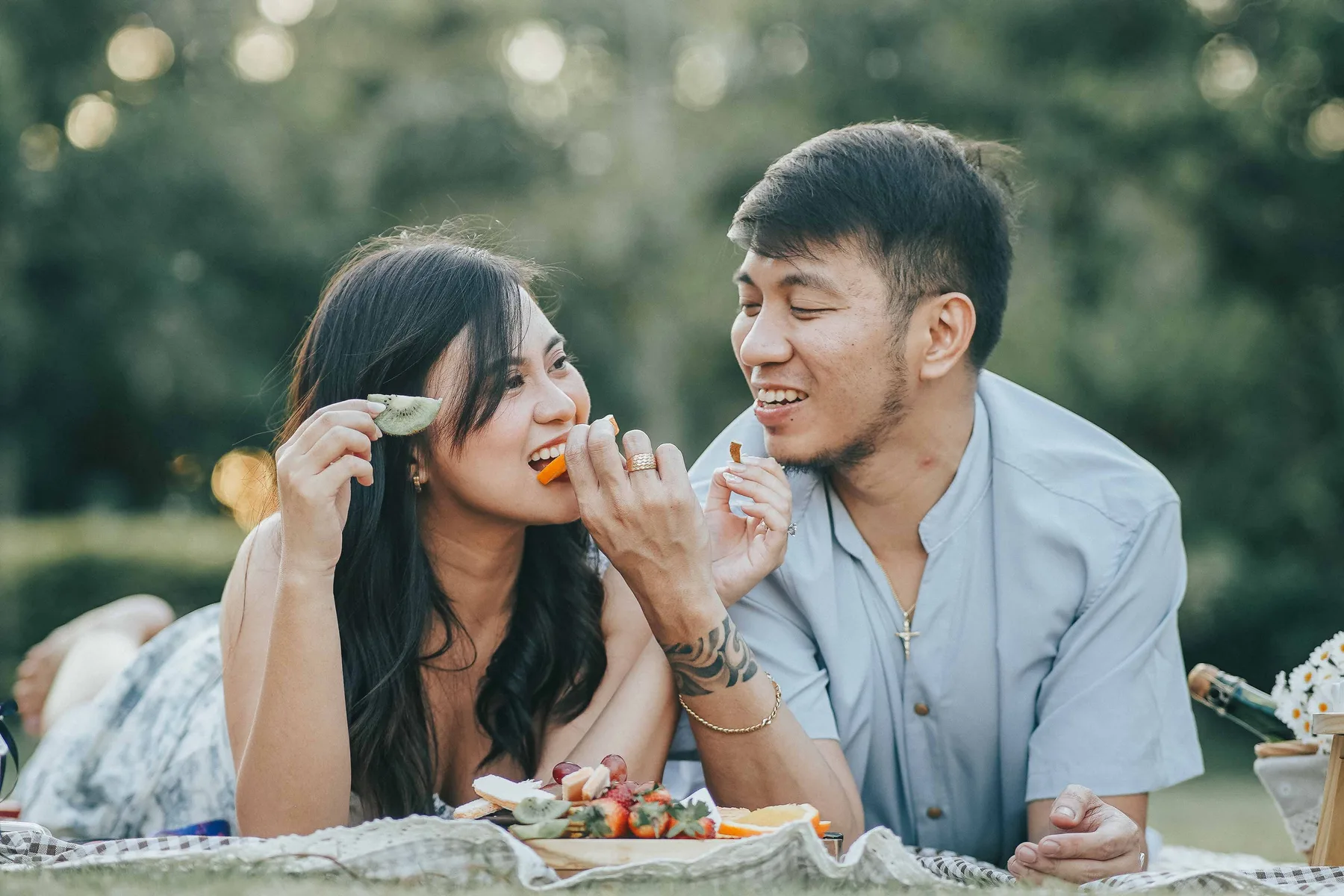 Joyful couple during garden engagement session in Silang, Cavite — by Vivid Visuals